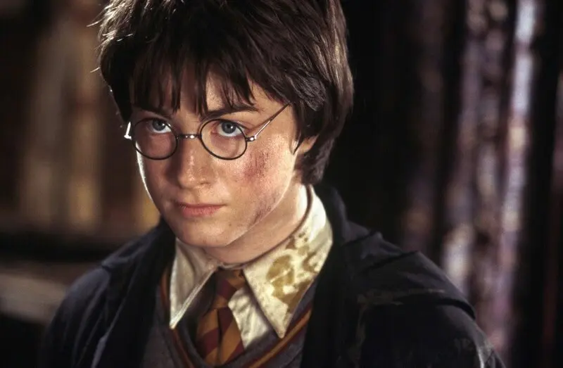 how old is harry potter in each movie